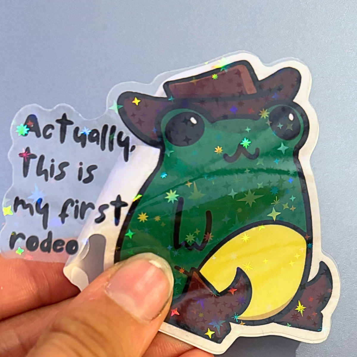 "Actually, This Is My First Rodeo" Cowboy Frog Holographic Transparent Vinyl Sticker